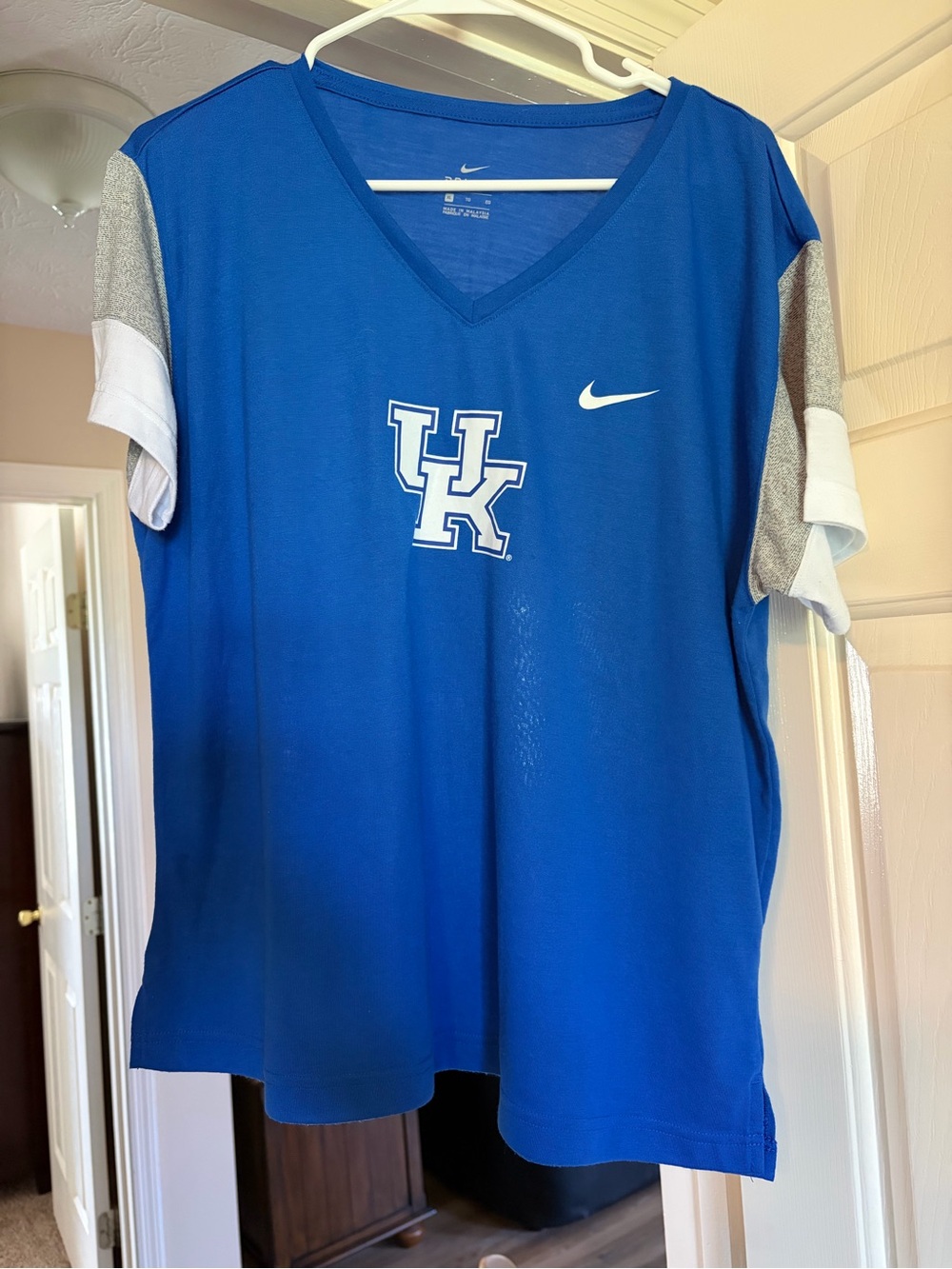 WoMen's Blue Nike Dri-FIT V-neck Shirt
